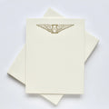 Winged hourglass letterpress stationery set printed in metallic gold