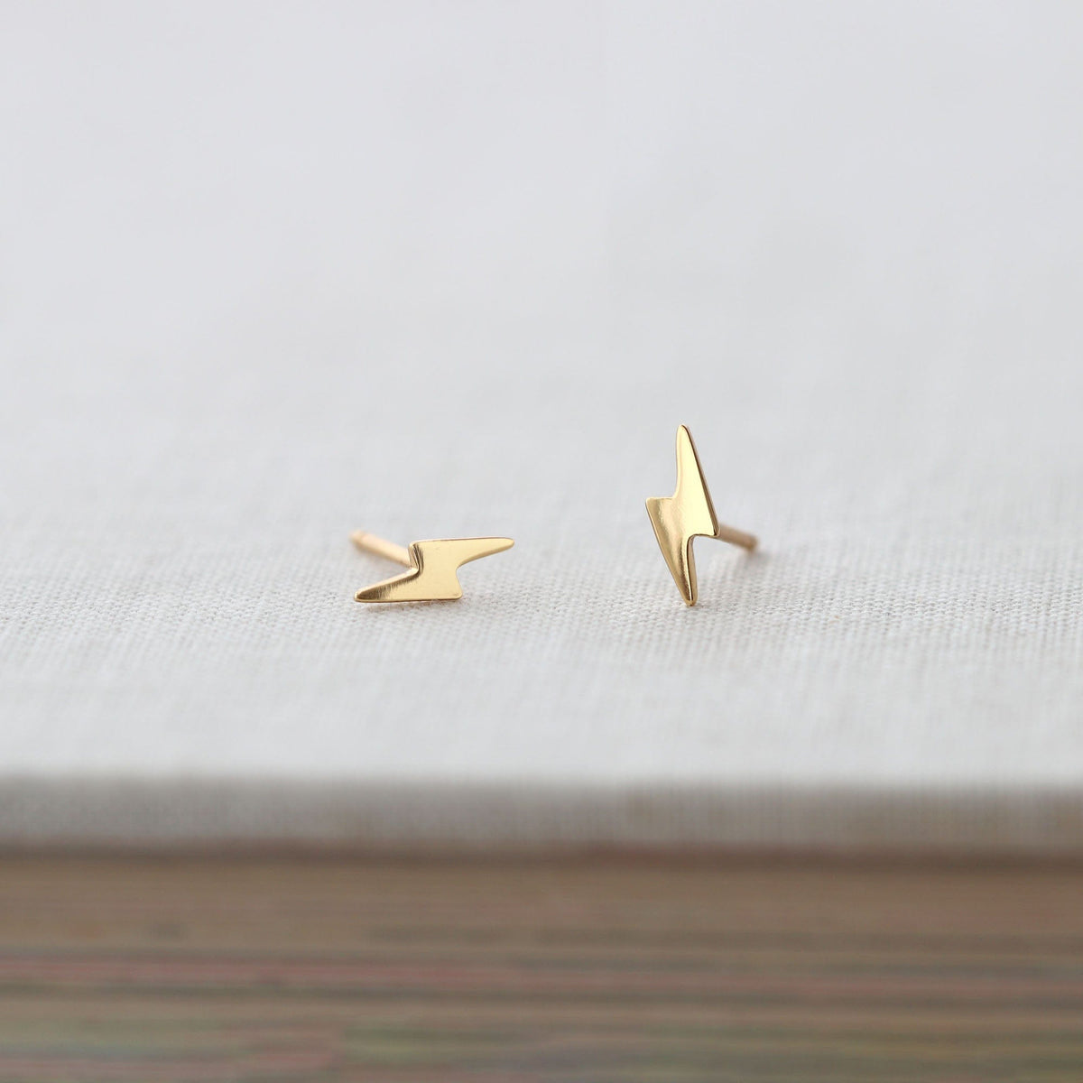 Kris Nations lightning bolt stud earrings in 18k gold vermeil