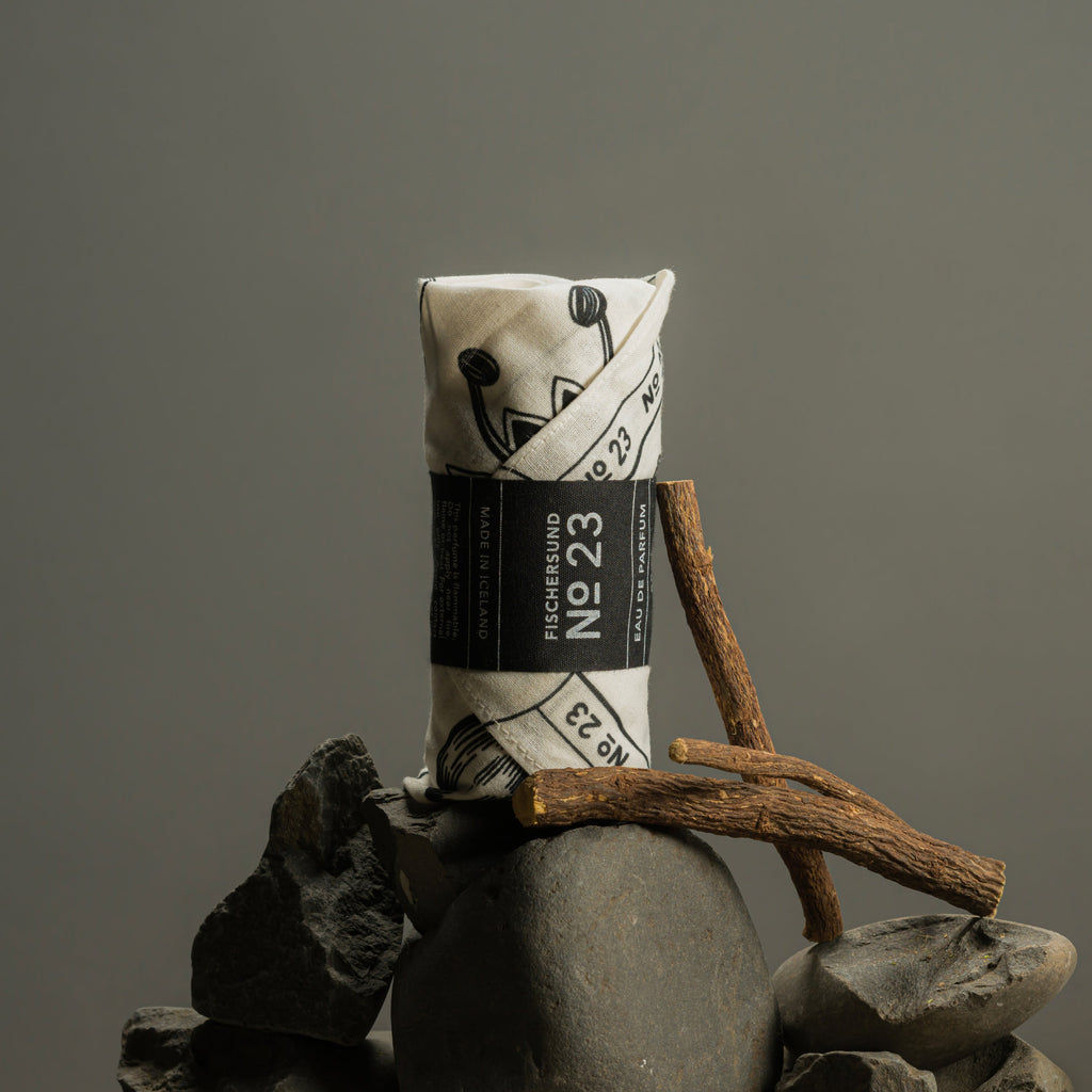 Fischersund eau de parfum wrapped in illustrated cotton bandana